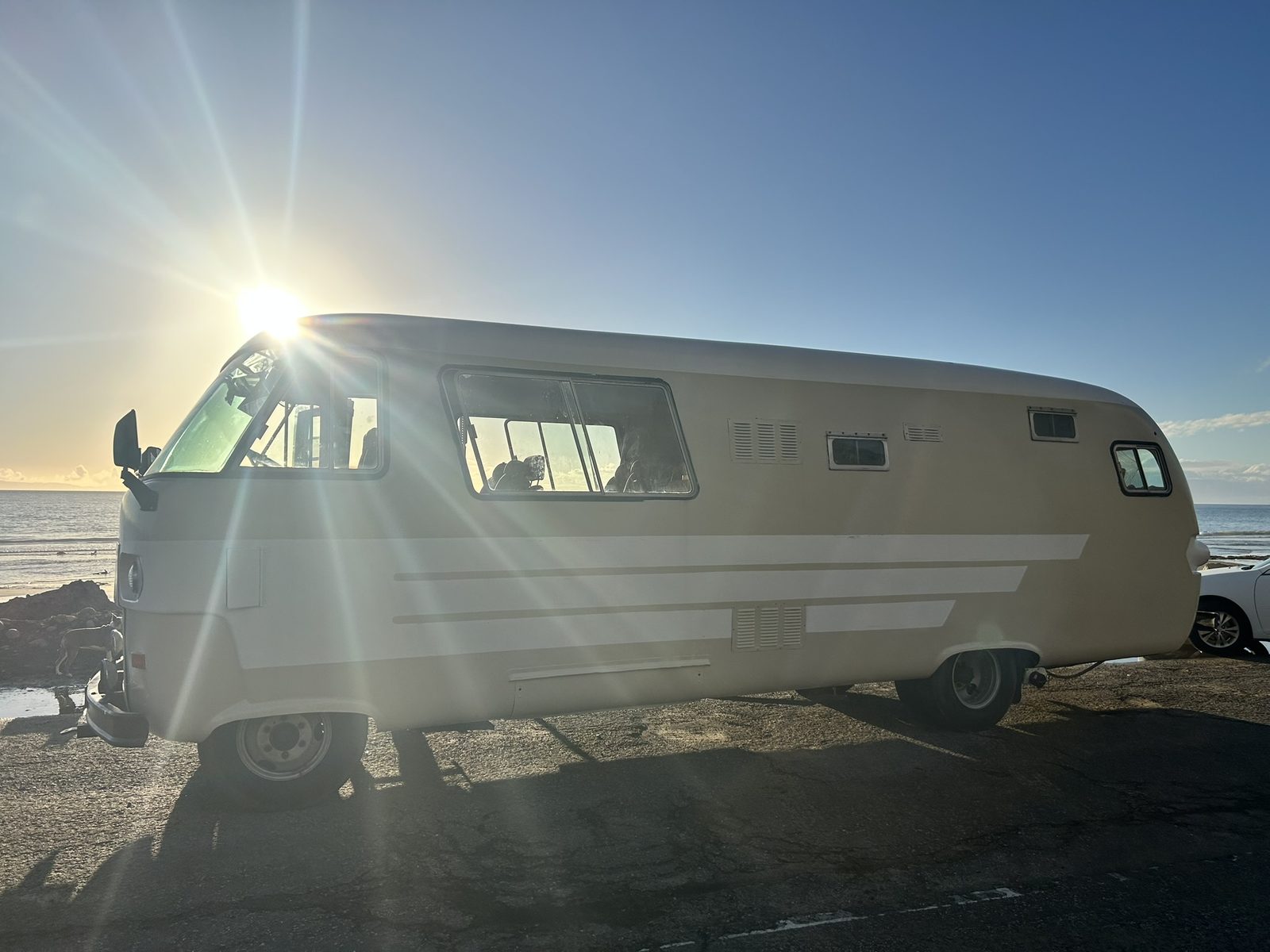 1966 Dodge Travco motorhome at sunset
